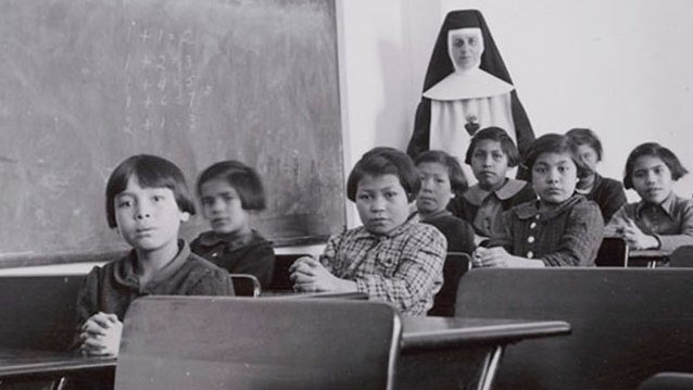 Residential School Nun classroom.jpg